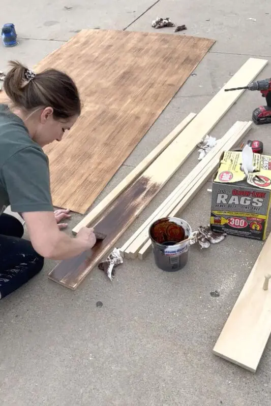 Using Early American by Minwax to stain a board and batten wall. 